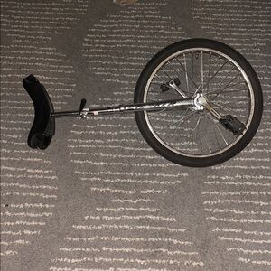 Black and silver Tonker unicycle.